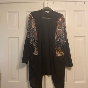 Distressed patchwork cardigan